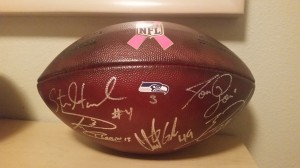 Game ball signed by players and coaches who talked with us!